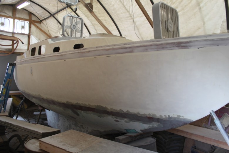 The exterior has been fully sanded.  The bottom has been faired several times and is nearly ready for primer.