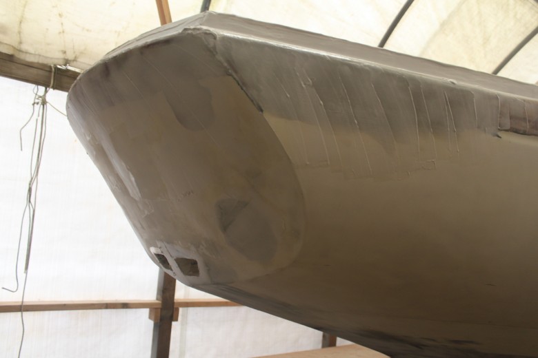 Cockpit drain (scupper) exits out the transom.