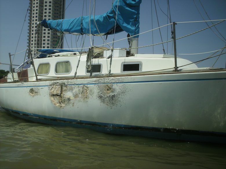 Damage after being slammed into a concrete sea wall during a storm.